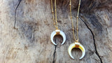 These delicate crescent Mother of Pearl pendants are the perfect surfer chic addition to any collection. 