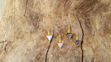 Triangle shell earring jackets in 14kt yellow gold.